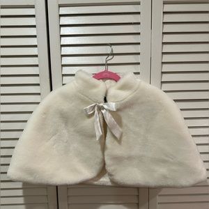 Girl’s short white cape